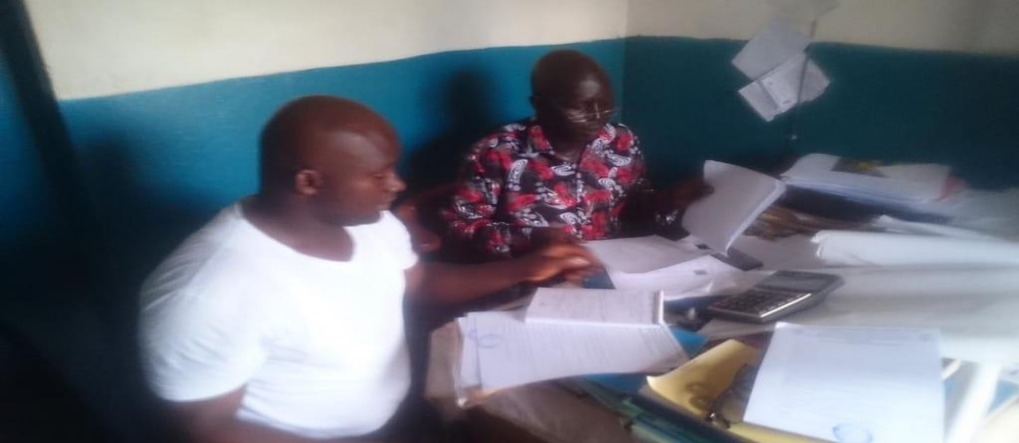 Community training session supporting the school fee subsidy monitoring activity